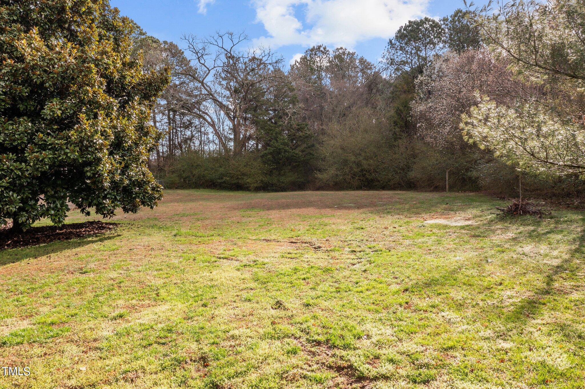 1129 Bermuda Run Knightdale, NC 27545 - Photo 31 of 34 a view of a swimming pool with an outdoor space