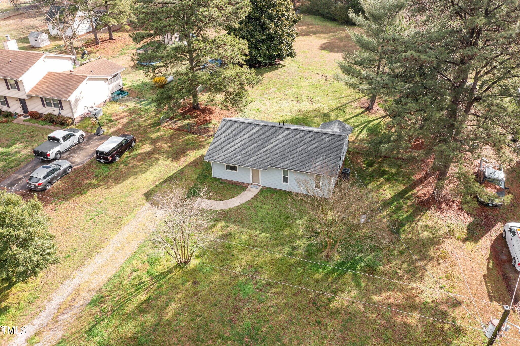 1129 Bermuda Run Knightdale, NC 27545 - Photo 33 of 34 a view of a house with a yard