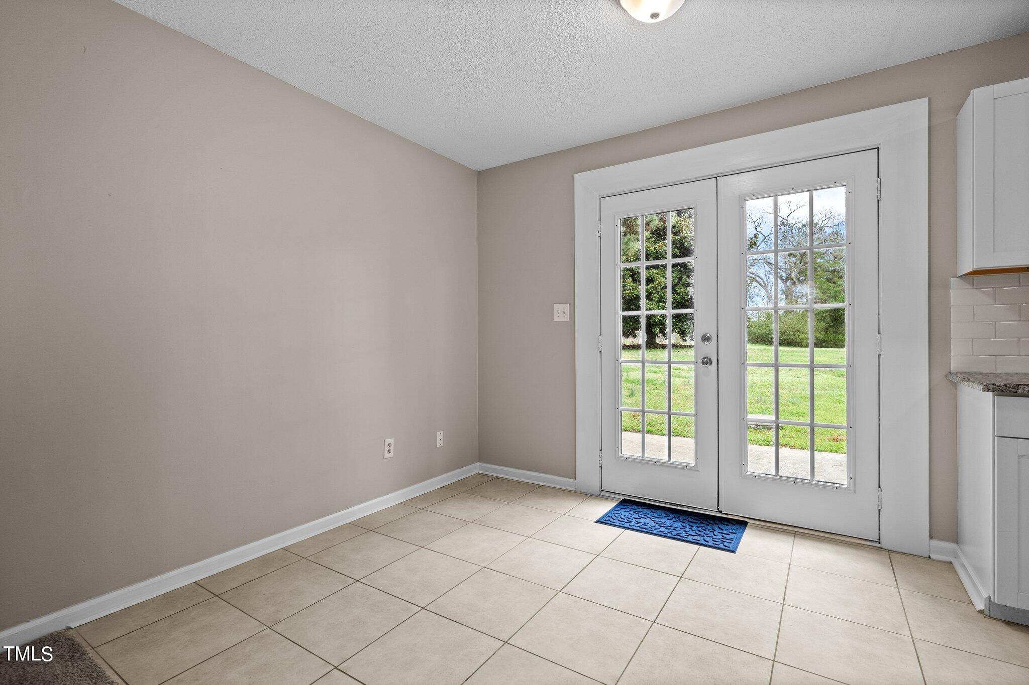 1129 Bermuda Run Knightdale, NC 27545 - Photo 9 of 34 a view of an empty room with a window