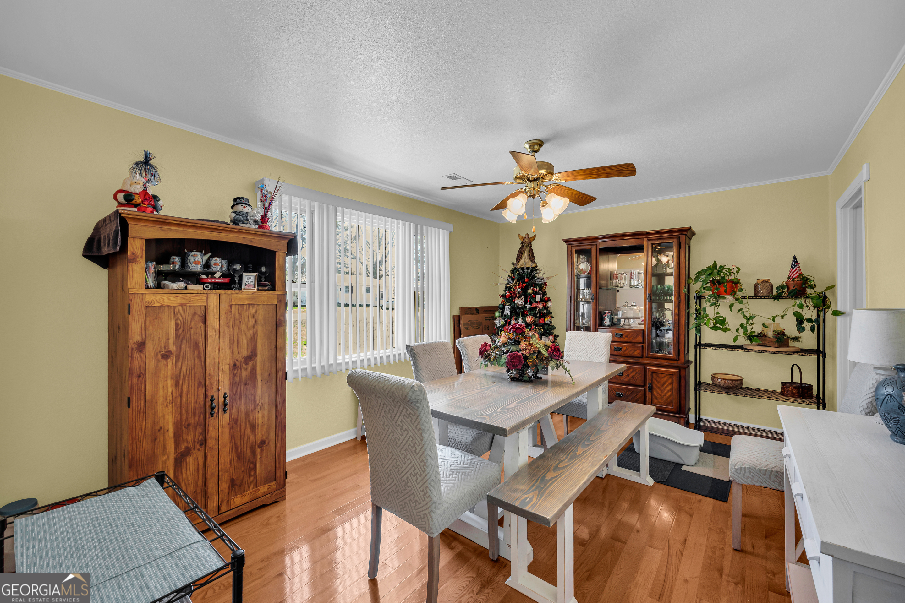 88 Maurice Way Lavonia, GA 30553 - Photo 11 of 65 a view of a dining room with furniture and a chandelier