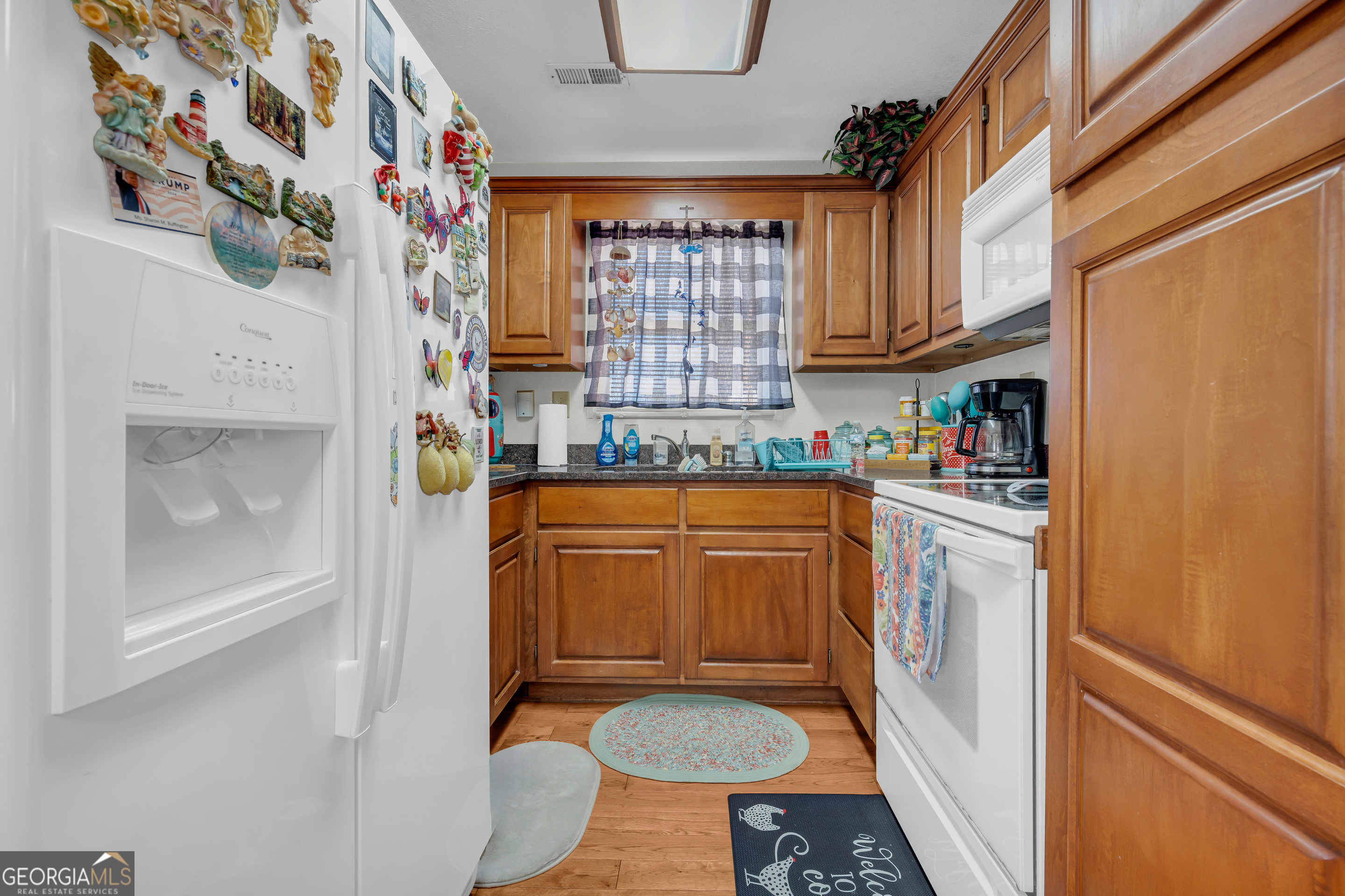 88 Maurice Way Lavonia, GA 30553 - Photo 21 of 65 a kitchen with stainless steel appliances a refrigerator and a stove