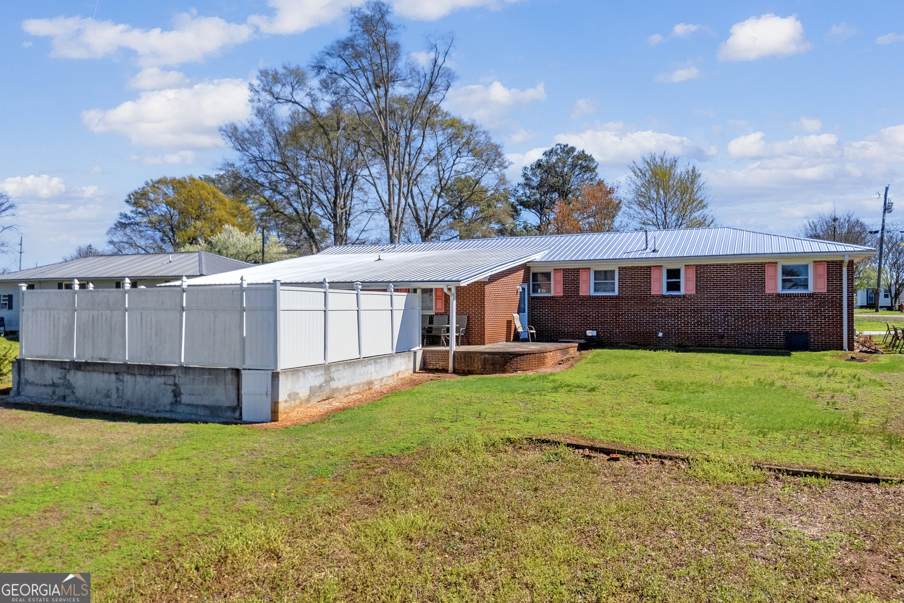 88 Maurice Way Lavonia, GA 30553 - Photo 33 of 65 a view of a house with a backyard