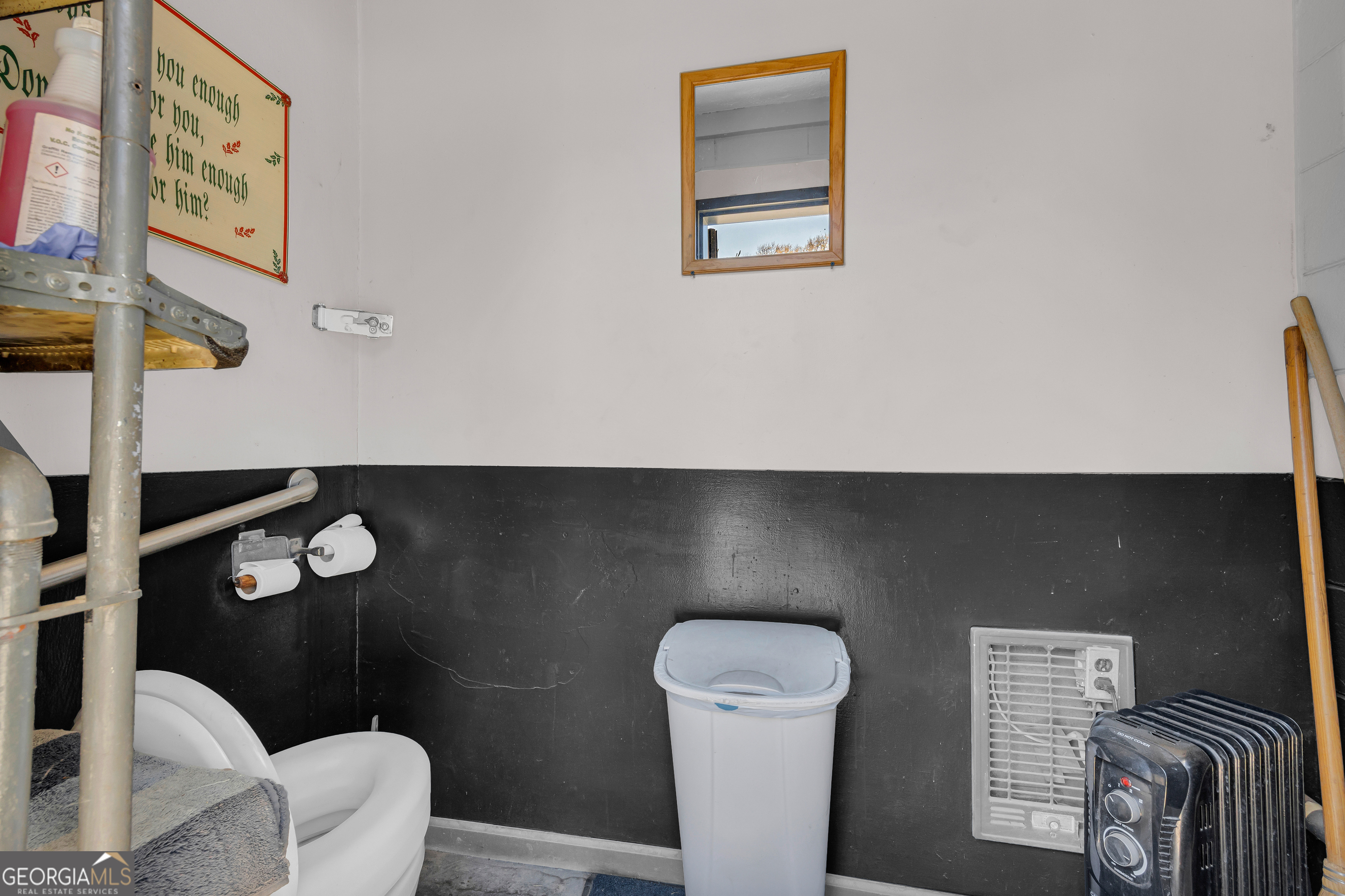 88 Maurice Way Lavonia, GA 30553 - Photo 51 of 65 a bathroom with a toilet and a sink