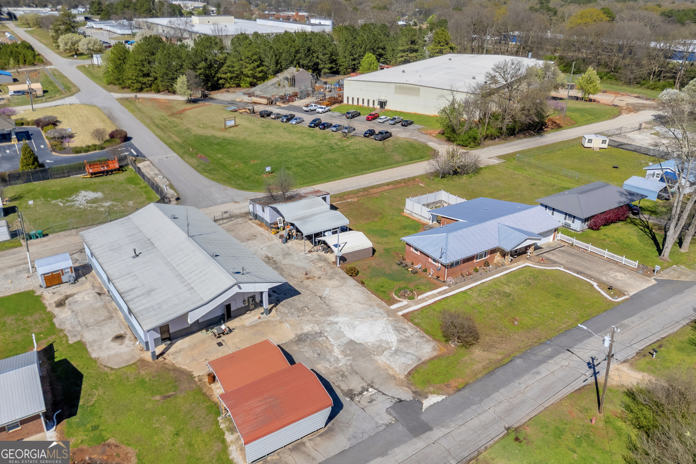 88 Maurice Way Lavonia, GA 30553 - Photo 64 of 65 an aerial view of residential houses with yard