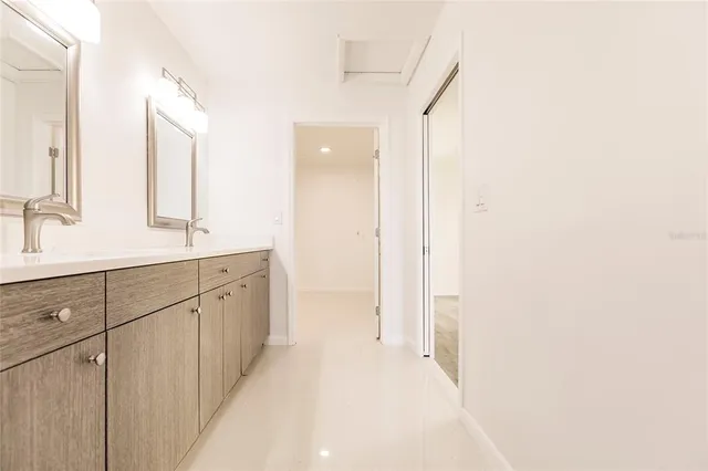 a view of a balcony with wooden floor