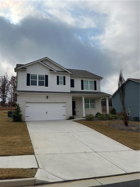 a front view of house with yard