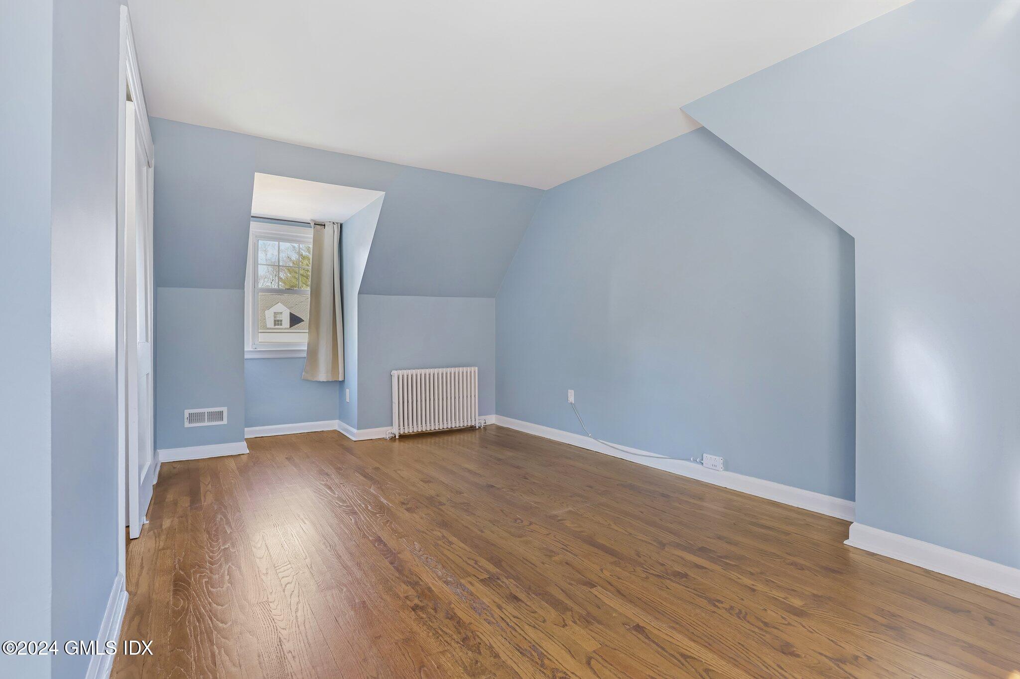 7 Hoover Road Riverside, CT 06878 - Photo 16 of 28 a view of a livingroom with wooden floor