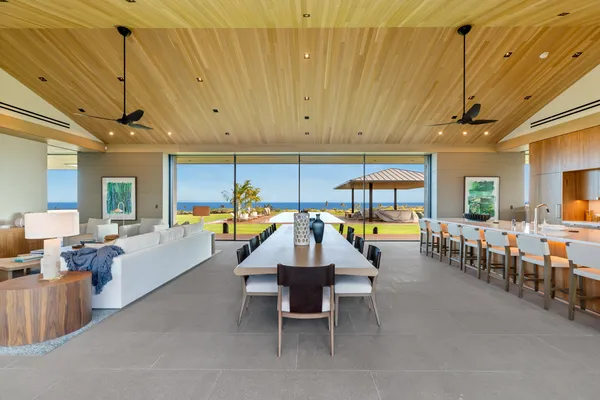 a living room with furniture and a table