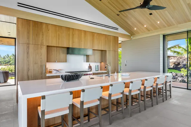 a kitchen with a table and chairs in it