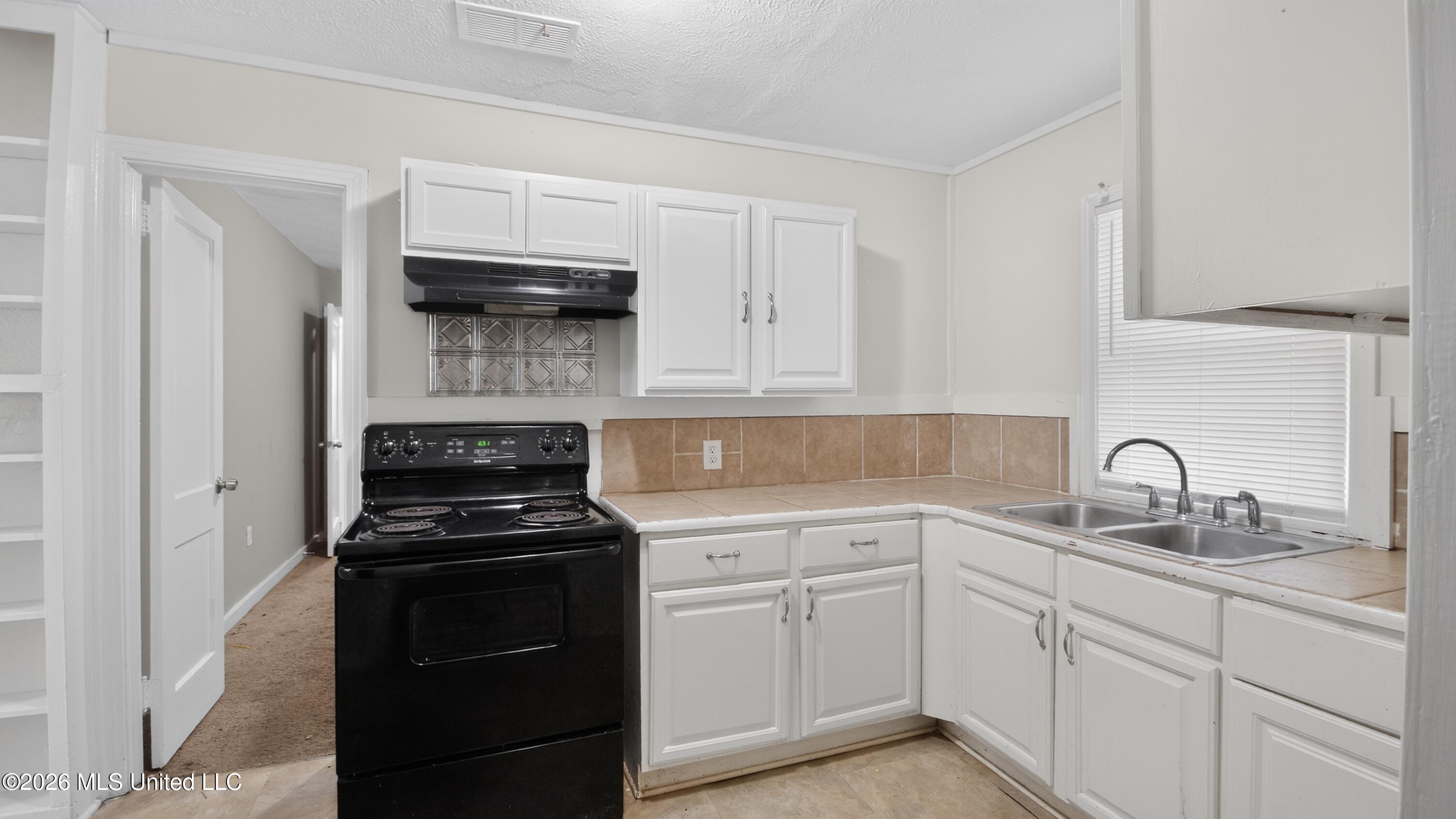 609 Launcelot Road Jackson, MS 39206 - Photo 14 of 30 17_609_Launcelot_Rd-Kitchen-0404