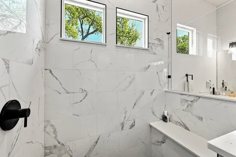 a bathroom with a bathtub and sink