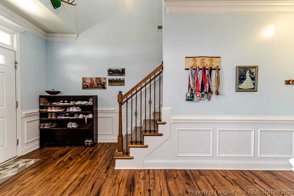 100 Lothian Ln. Cameron, NC 28326 - Photo 27 of 45 a view of entryway with wooden floor