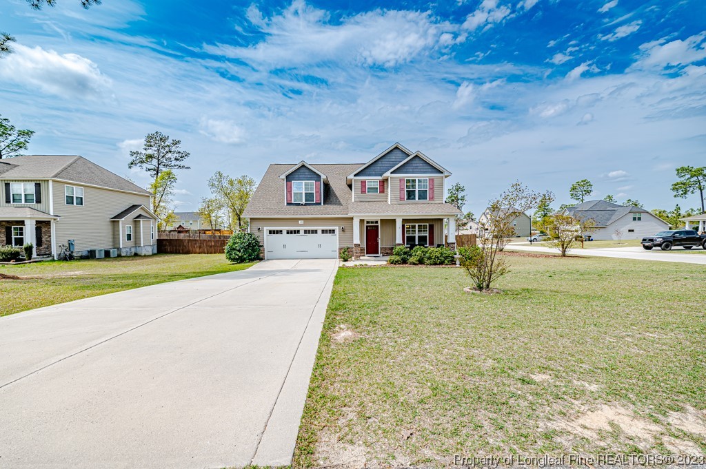 100 Lothian Ln. Cameron, NC 28326 - Photo 3 of 45 a front view of a house with a yard