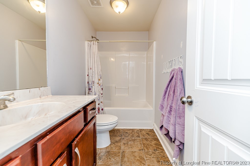 100 Lothian Ln. Cameron, NC 28326 - Photo 32 of 45 a bathroom with a sink toilet and shower