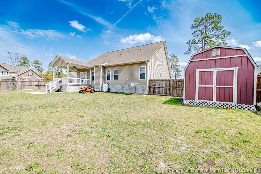 100 Lothian Ln. Cameron, NC 28326 - Photo 38 of 45 a front view of a house with a yard