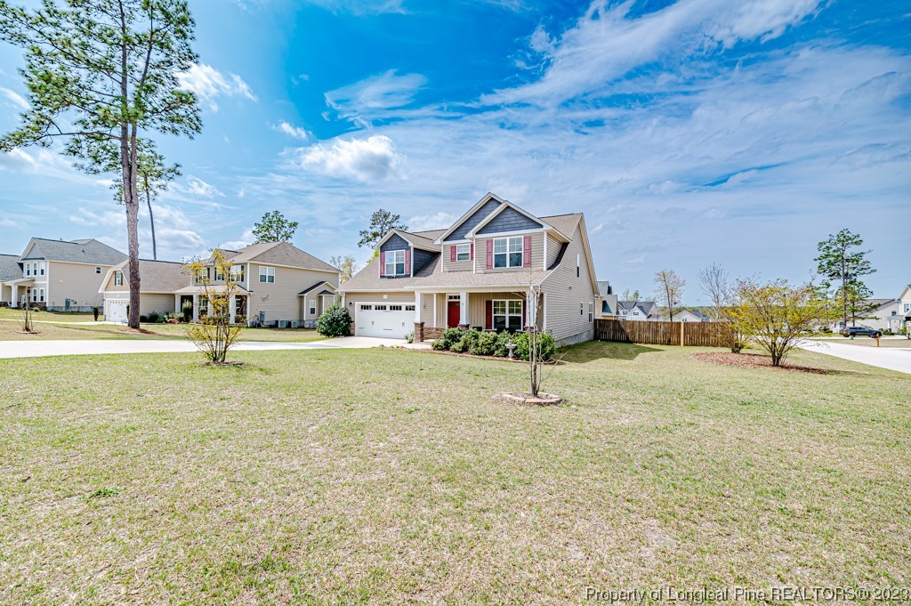 100 Lothian Ln. Cameron, NC 28326 - Photo 41 of 45 a house with trees in front of it