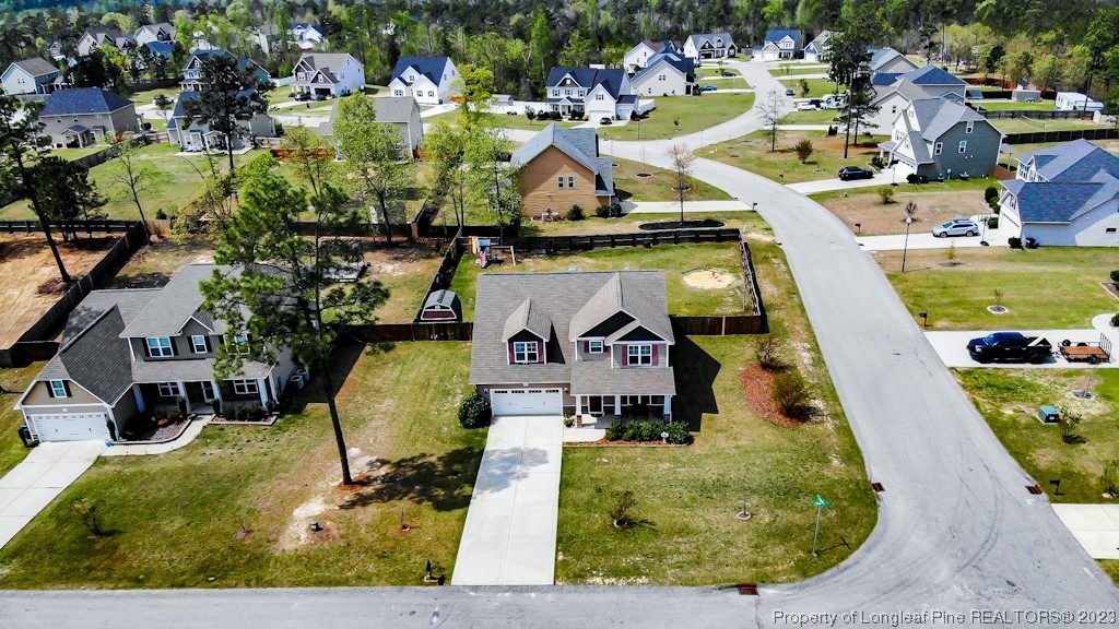 100 Lothian Ln. Cameron, NC 28326 - Photo 45 of 45 an aerial view of a house with outdoor space