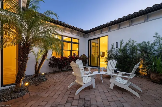 a building outdoor space with patio furniture