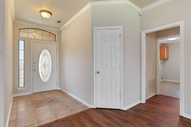 a view of livingroom with hallway with wooden floor