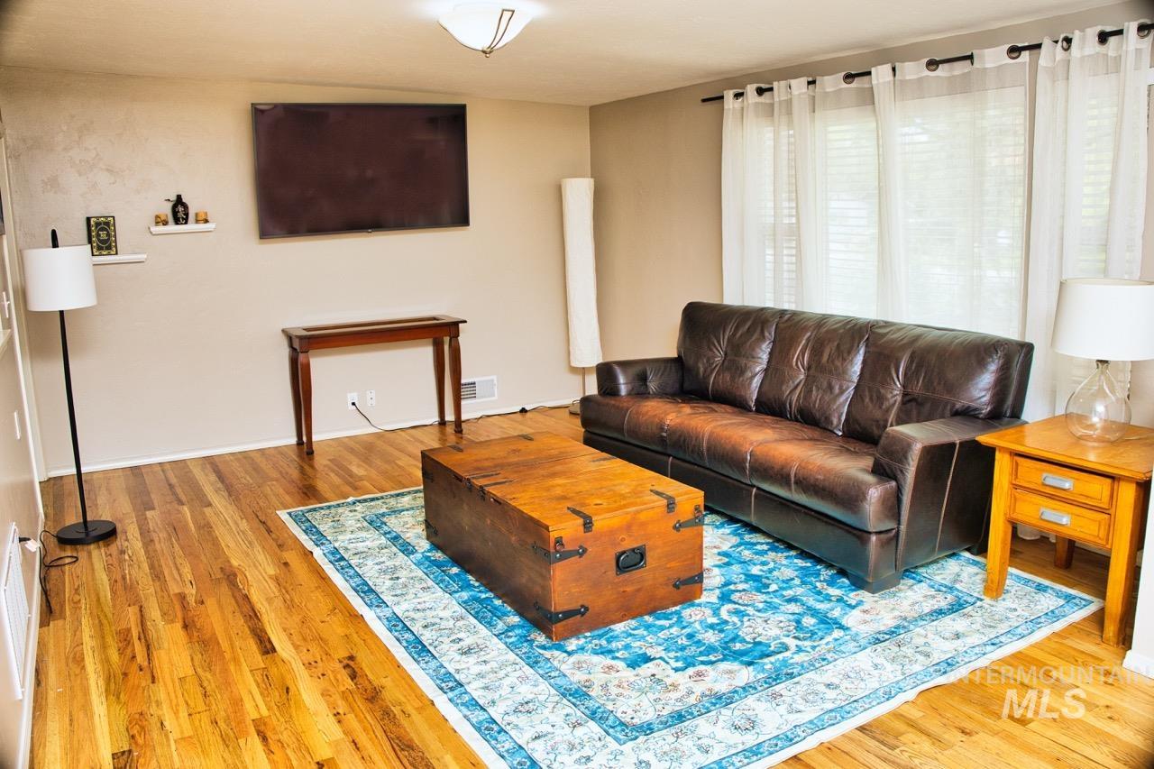 2223 West Spaulding Street Boise, ID 83705 - Photo 2 of 50 Living area with light wood finished floors