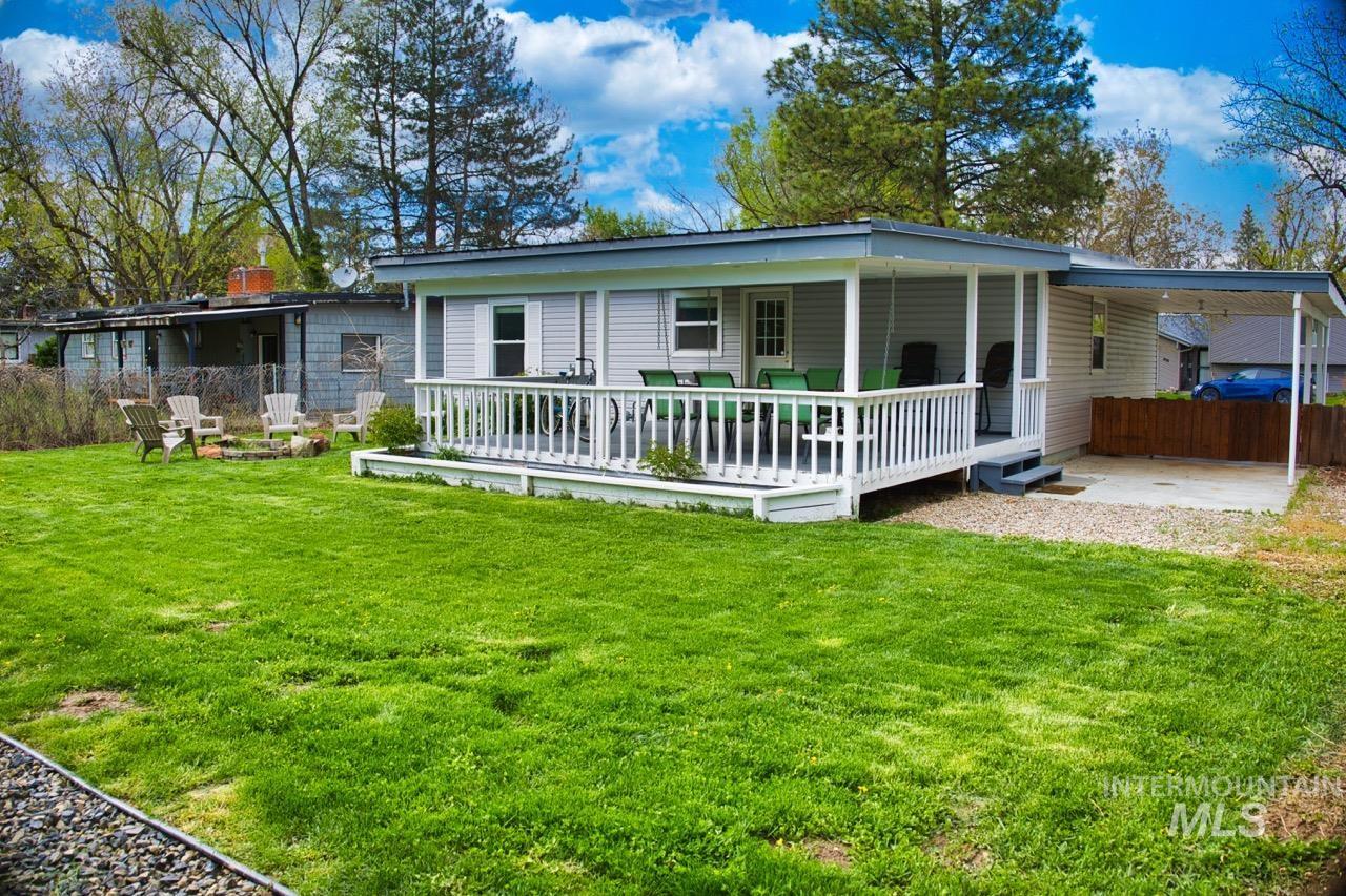 2223 West Spaulding Street Boise, ID 83705 - Photo 31 of 50 Rear view of house with a patio area and a carport