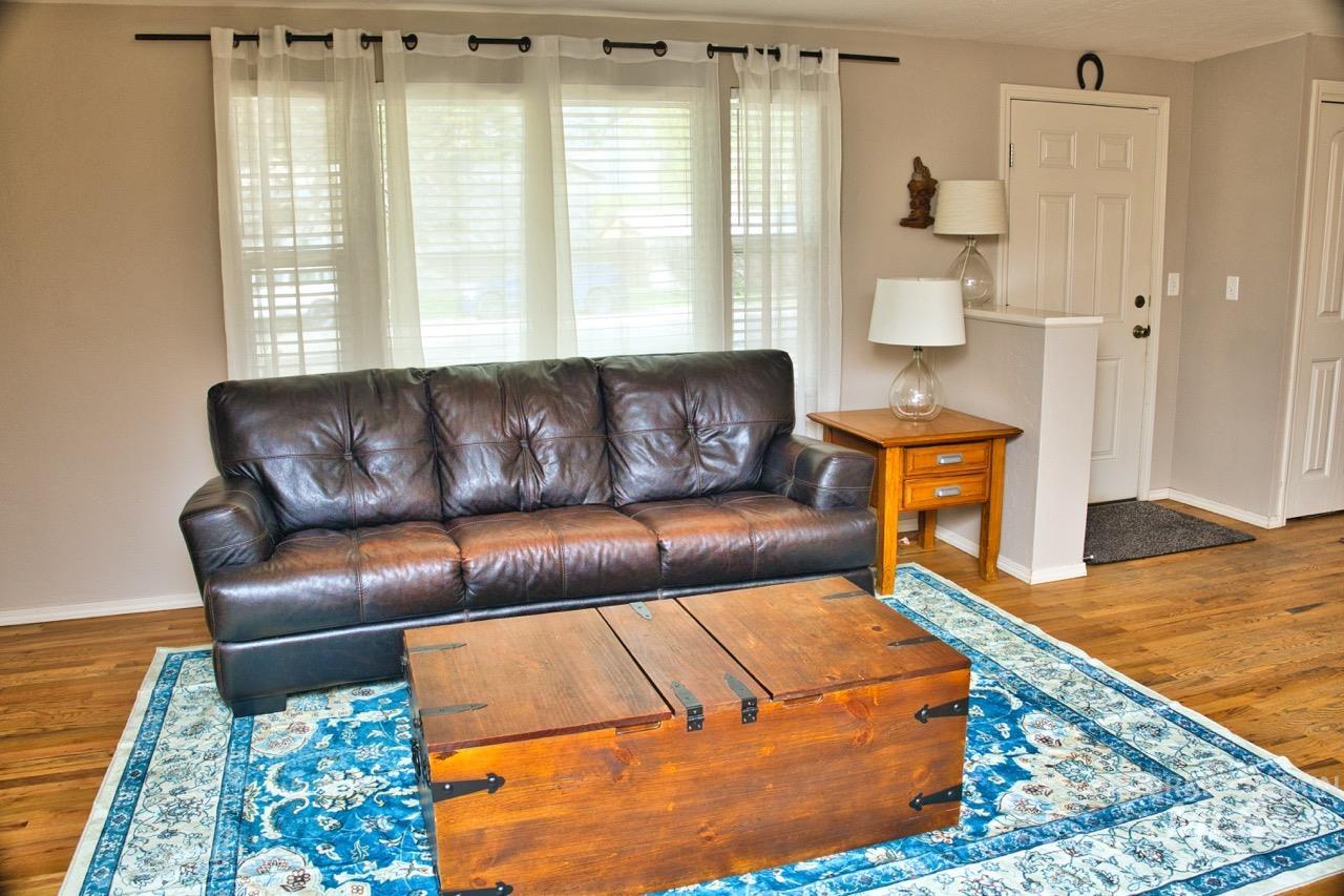 2223 West Spaulding Street Boise, ID 83705 - Photo 7 of 50 Living area with wood finished floors and baseboards
