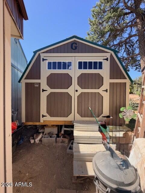 2019 Broken Arrow Road Overgaard, AZ 85933 - Photo 18 of 19 a view of a chair and table in the backyard