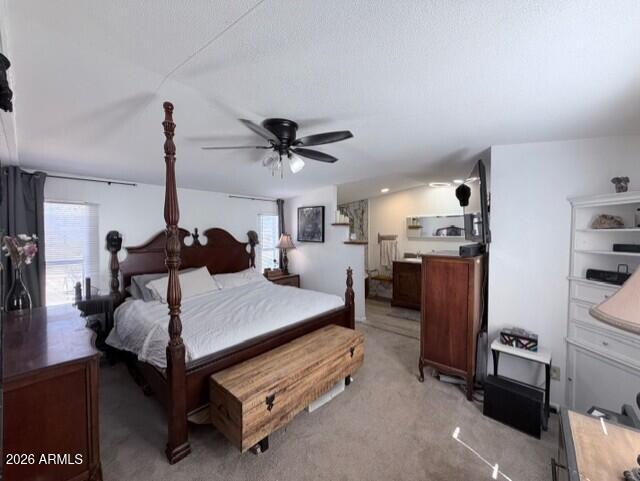2019 Broken Arrow Road Overgaard, AZ 85933 - Photo 5 of 19 a bed room with a bed and a ceiling fan