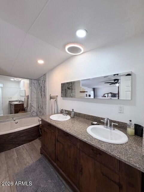 2019 Broken Arrow Road Overgaard, AZ 85933 - Photo 7 of 19 a en suite bathroom with a granite countertop sink and a mirror