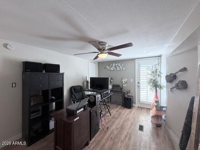 2019 Broken Arrow Road Overgaard, AZ 85933 - Photo 10 of 19 a view of a workspace with furniture and a window