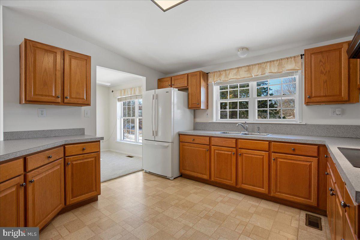 2111 Horace Ward Road Owings, MD 20736 - Photo 13 of 47 Kitchen leading to breakfast nook.