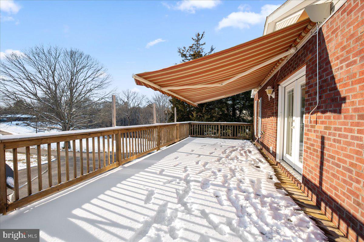 2111 Horace Ward Road Owings, MD 20736 - Photo 17 of 47 Large deck with awning off family room.