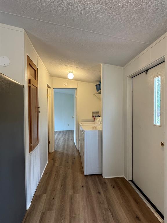 4317 284th Street Branford, FL 32008 - Photo 35 of 45 a view of a hallway with wooden floor and cabinets