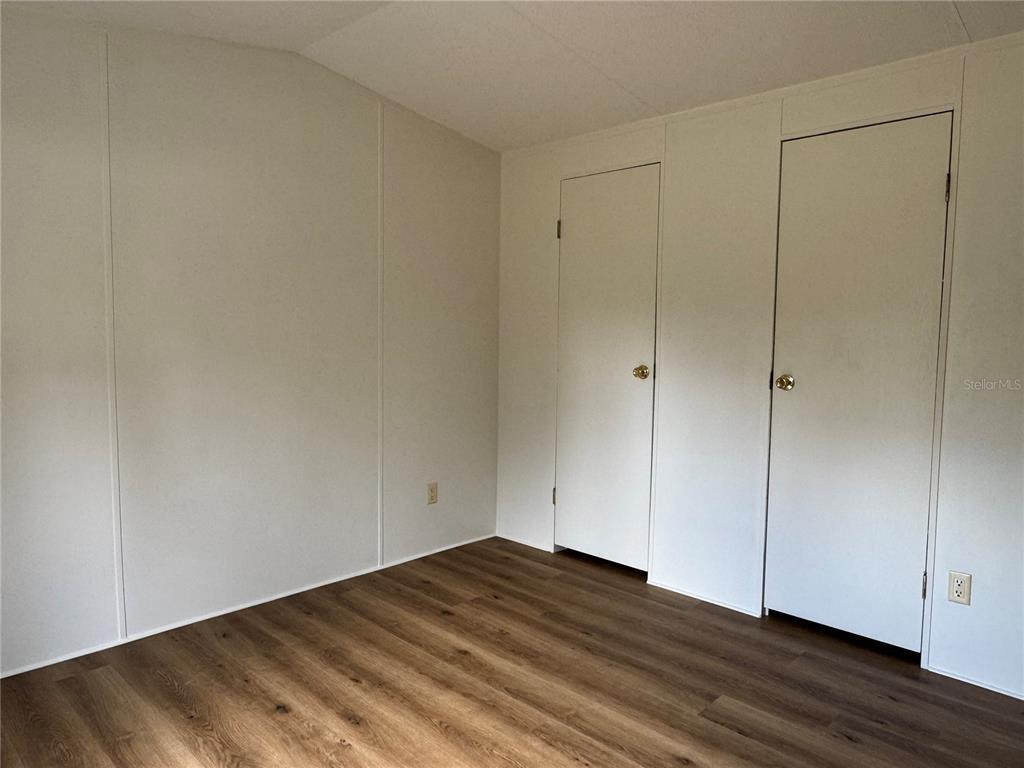 4317 284th Street Branford, FL 32008 - Photo 39 of 45 a view of an empty room with wooden floor