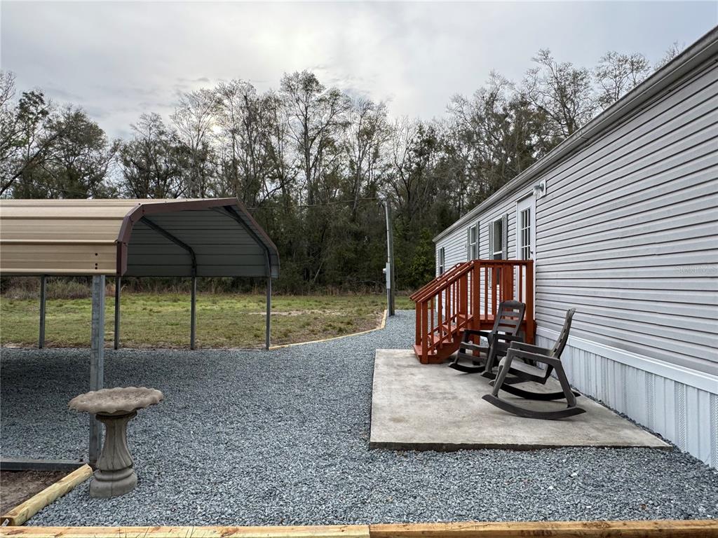 4317 284th Street Branford, FL 32008 - Photo 6 of 45 a view of a backyard with a sitting area