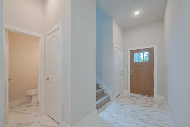 a picture of a bathroom with a shower