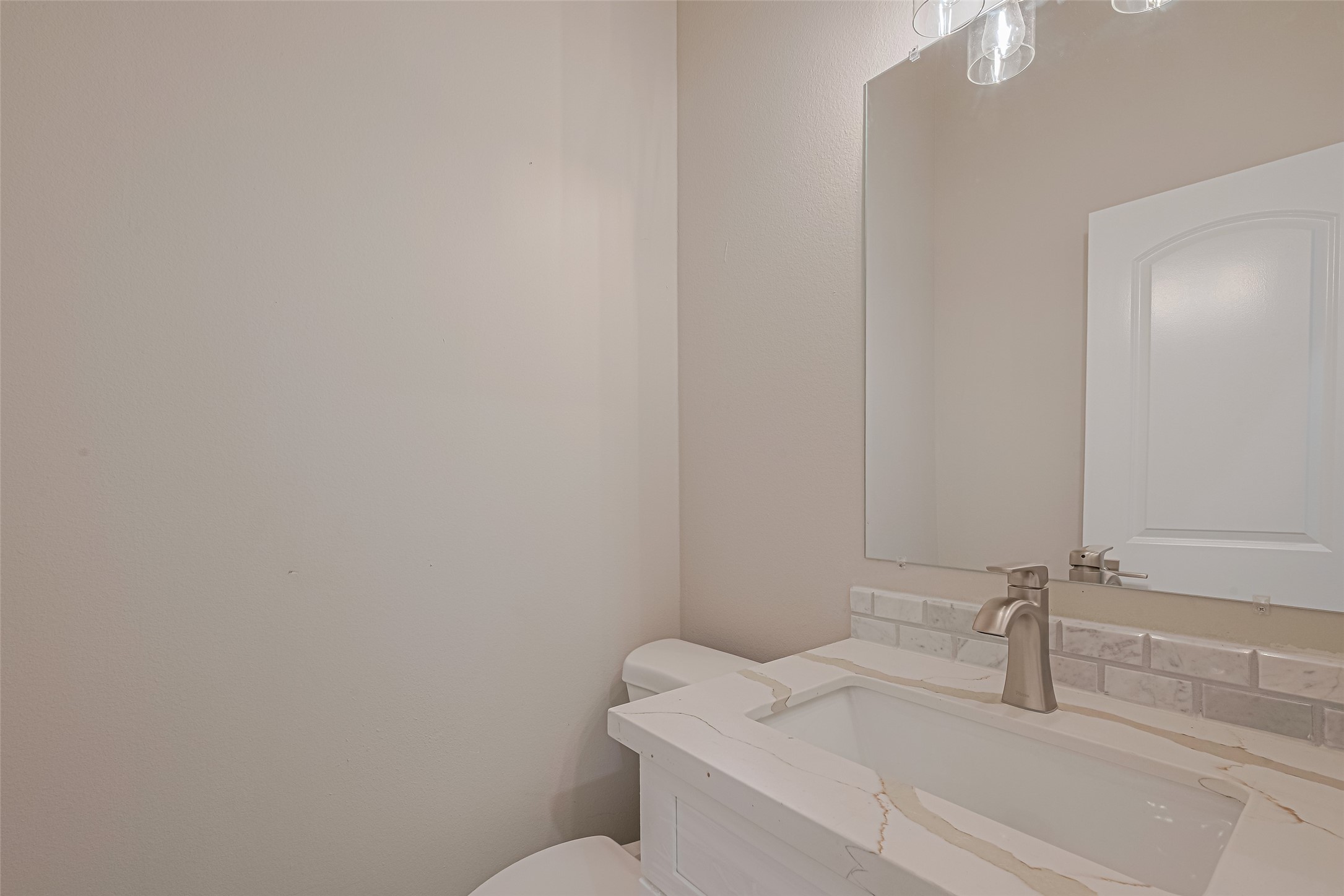 2414 Sam Wilson Street Houston, TX 77020 - Photo 4 of 29 a bathroom with a sink and a vanity