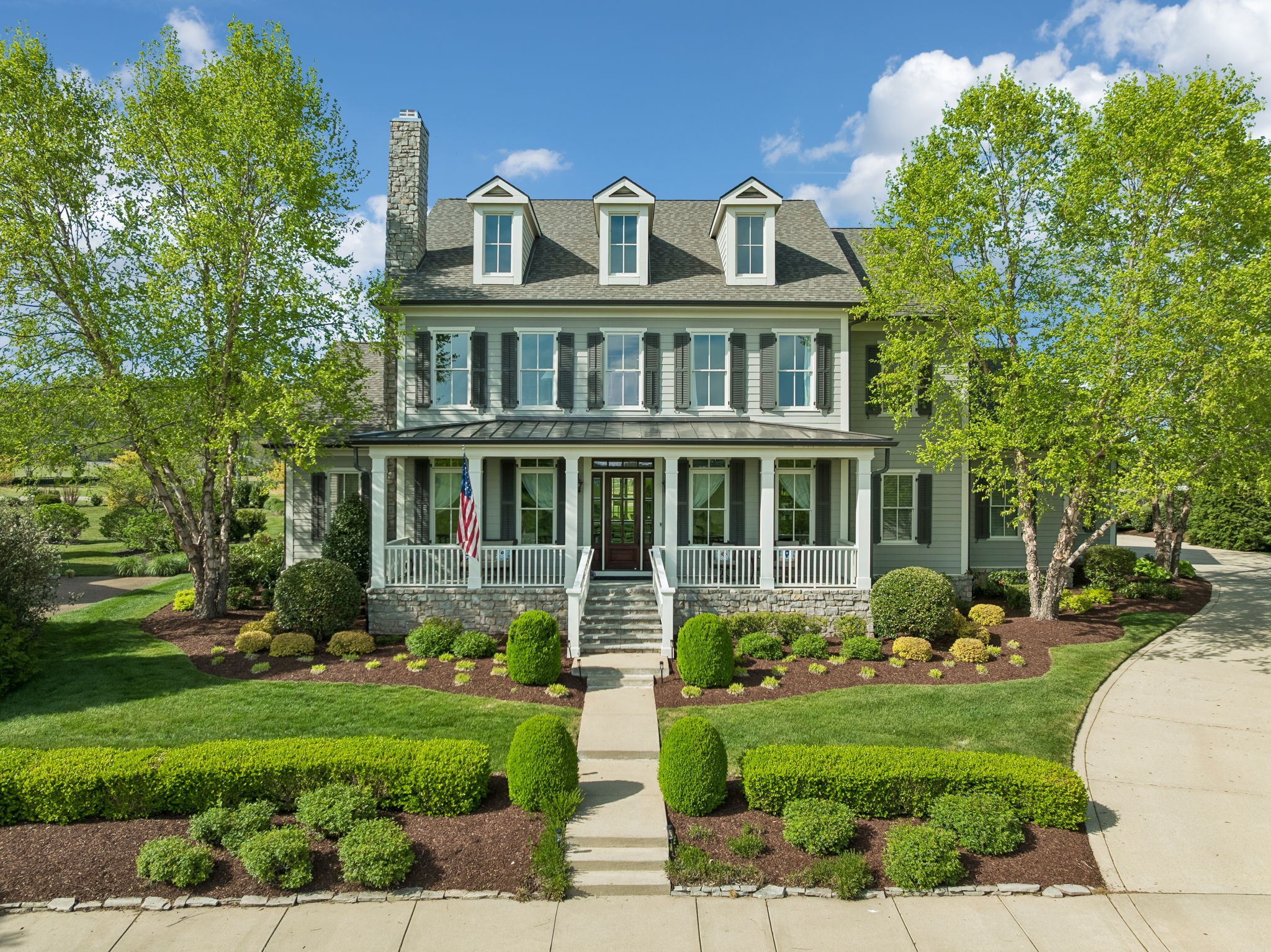 6033 Native Pony Trail College Grove, TN 37046 - Photo 75 of 87 a front view of a house with a yard