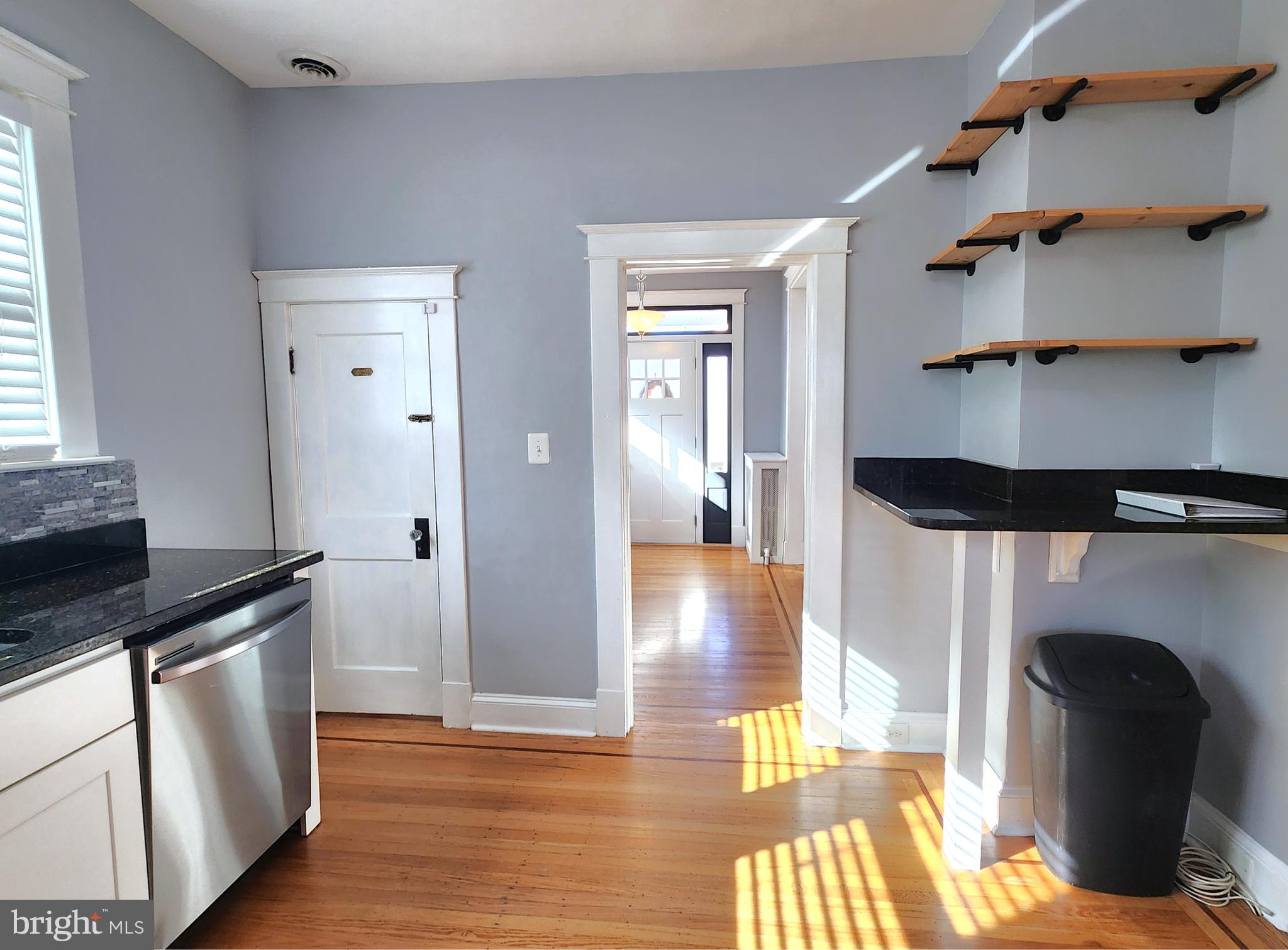 615 Old Home Road Baltimore, MD 21206 - Photo 15 of 31 a view of hallway with wooden floor and furniture
