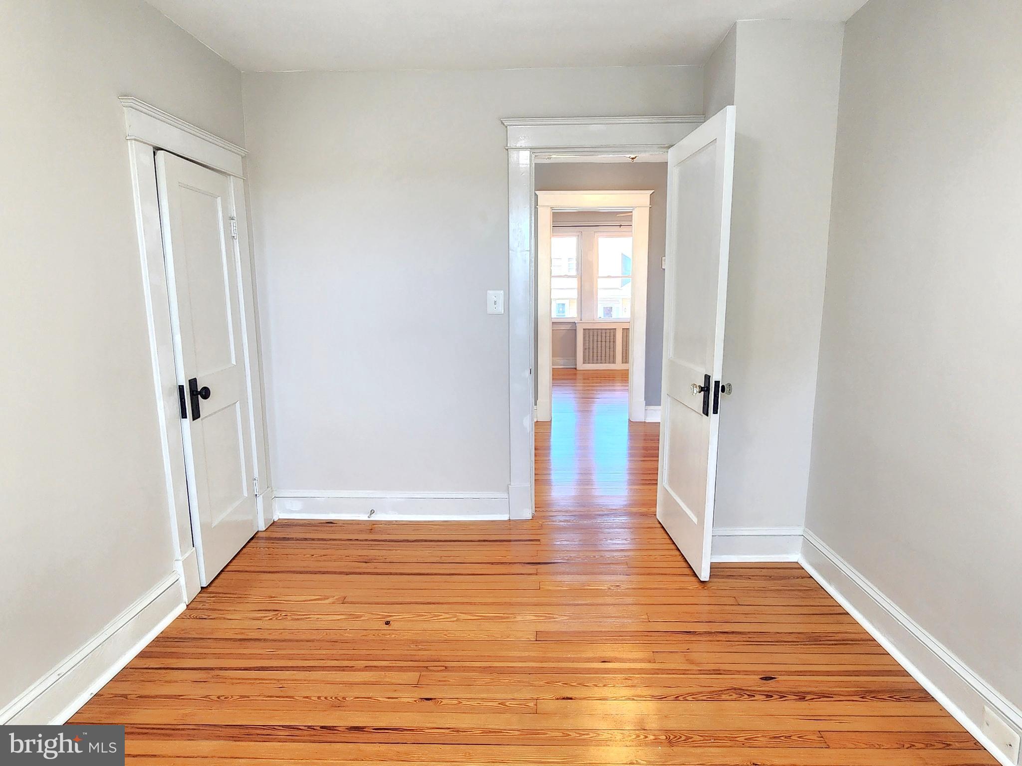 615 Old Home Road Baltimore, MD 21206 - Photo 24 of 31 a view of an empty room with wooden floor