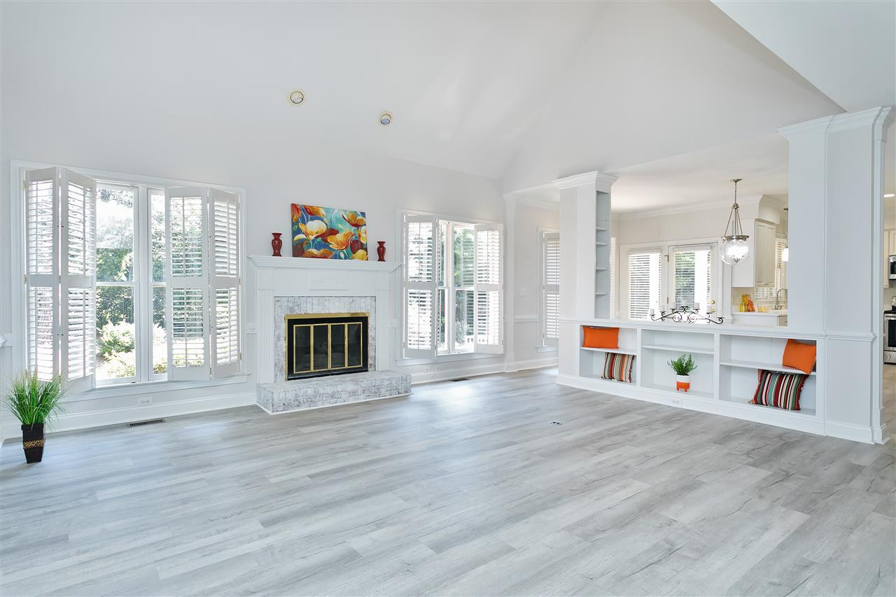 1904 Capers Court Raleigh, NC 27612 - Photo 7 of 29 Family room highlighted by the Unique Cathedral Ceiling Den/Family/Great Room