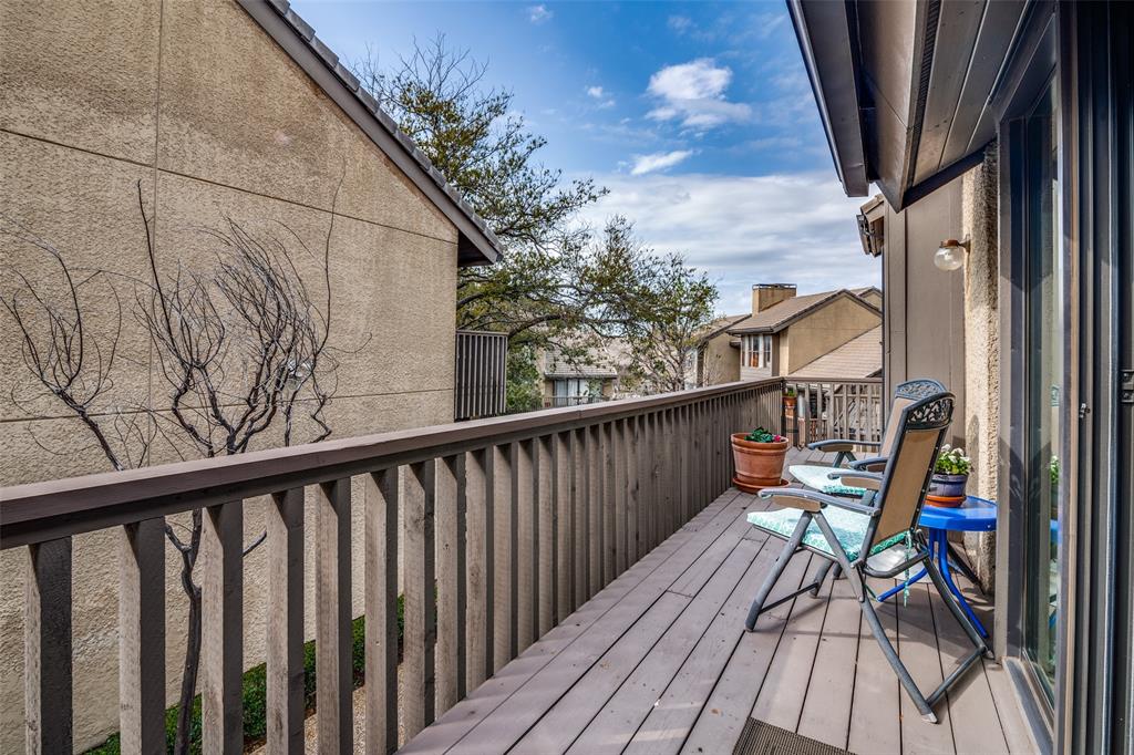 4559 North O'Connor Road, Unit 2289 Irving, TX 75062 - Photo 19 of 23 View of wooden deck accessed from living room and primary bedroom first floor