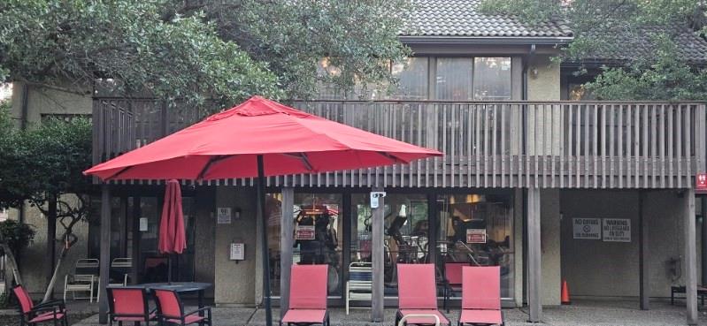 4559 North O'Connor Road, Unit 2289 Irving, TX 75062 - Photo 23 of 23 View of property's community gym with it's walll sized windows facing the pool