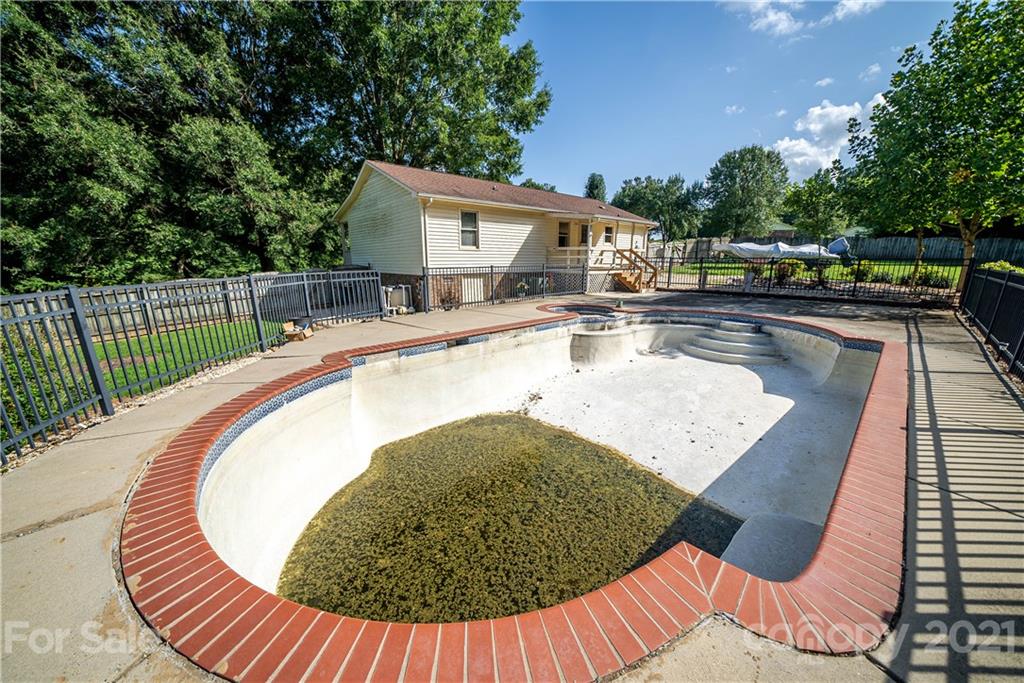 8623 Smith Road Stanfield, NC 28163 - Photo 26 of 27 swimming pool view with a outdoor space