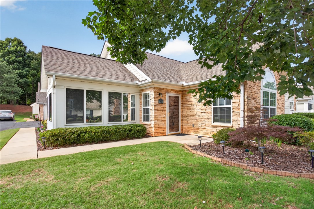 134 Life Style Lane Anderson, SC 29621 - Photo 30 of 44 A welcoming stone facade and manicured lawn invite you to this charming single-story residence.