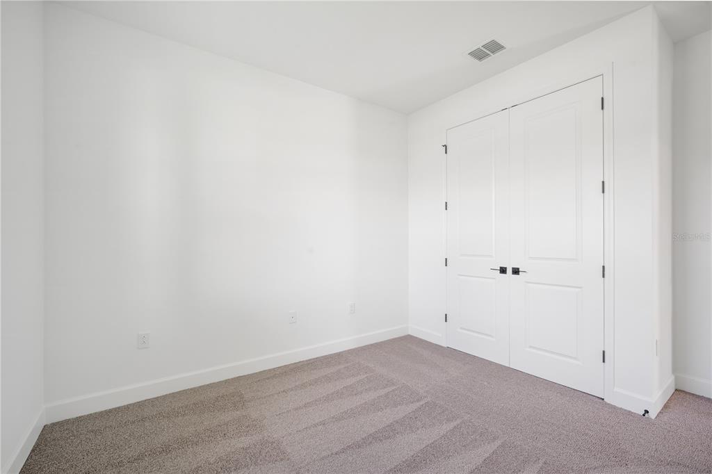 9196 Players Drive Weeki Wachee, FL 34613 - Photo 25 of 29 a view of an empty room