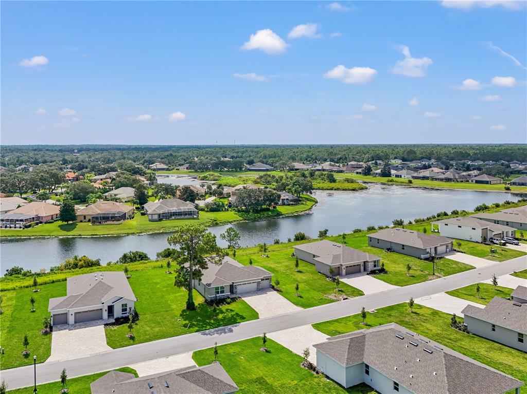 9196 Players Drive Weeki Wachee, FL 34613 - Photo 29 of 29 a view of lake and houses with outdoor space