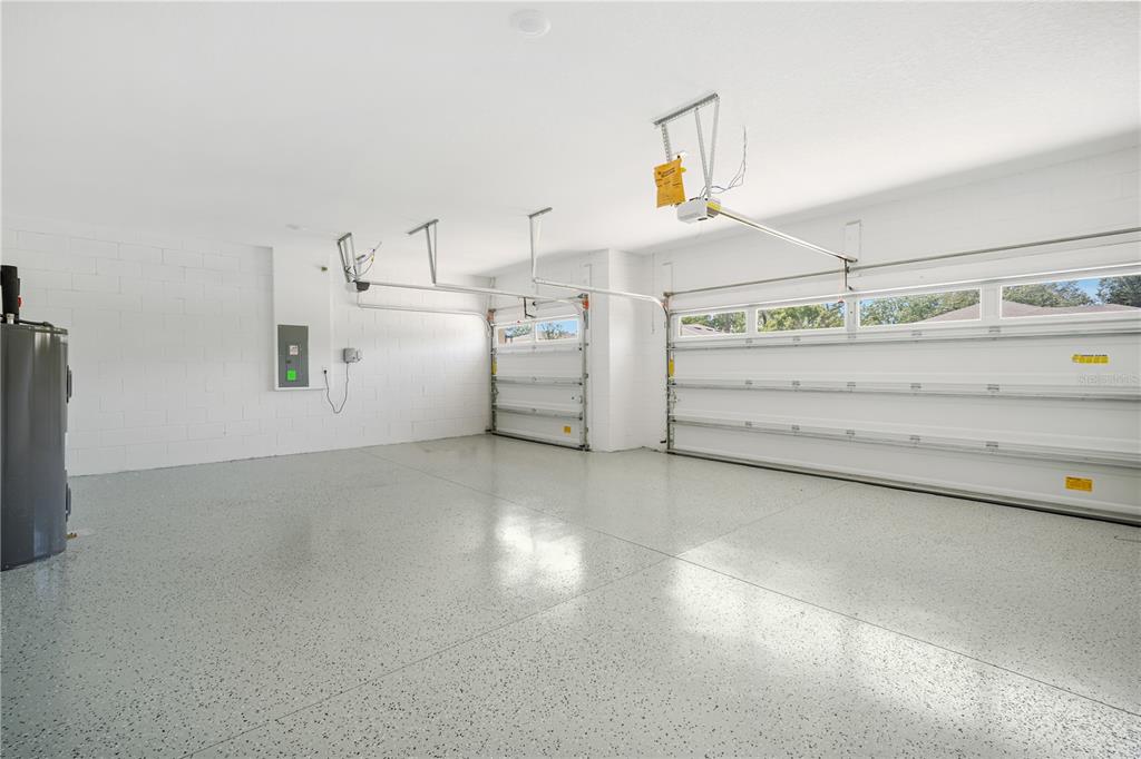 9196 Players Drive Weeki Wachee, FL 34613 - Photo 4 of 29 a utility room with cabinets