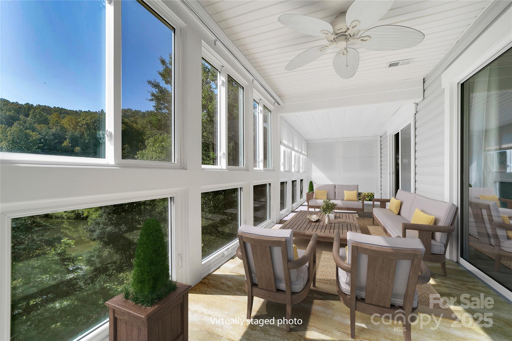 110 Lakeview Court Brevard, NC 28712 - Photo 11 of 30 a view of a patio with table and chairs