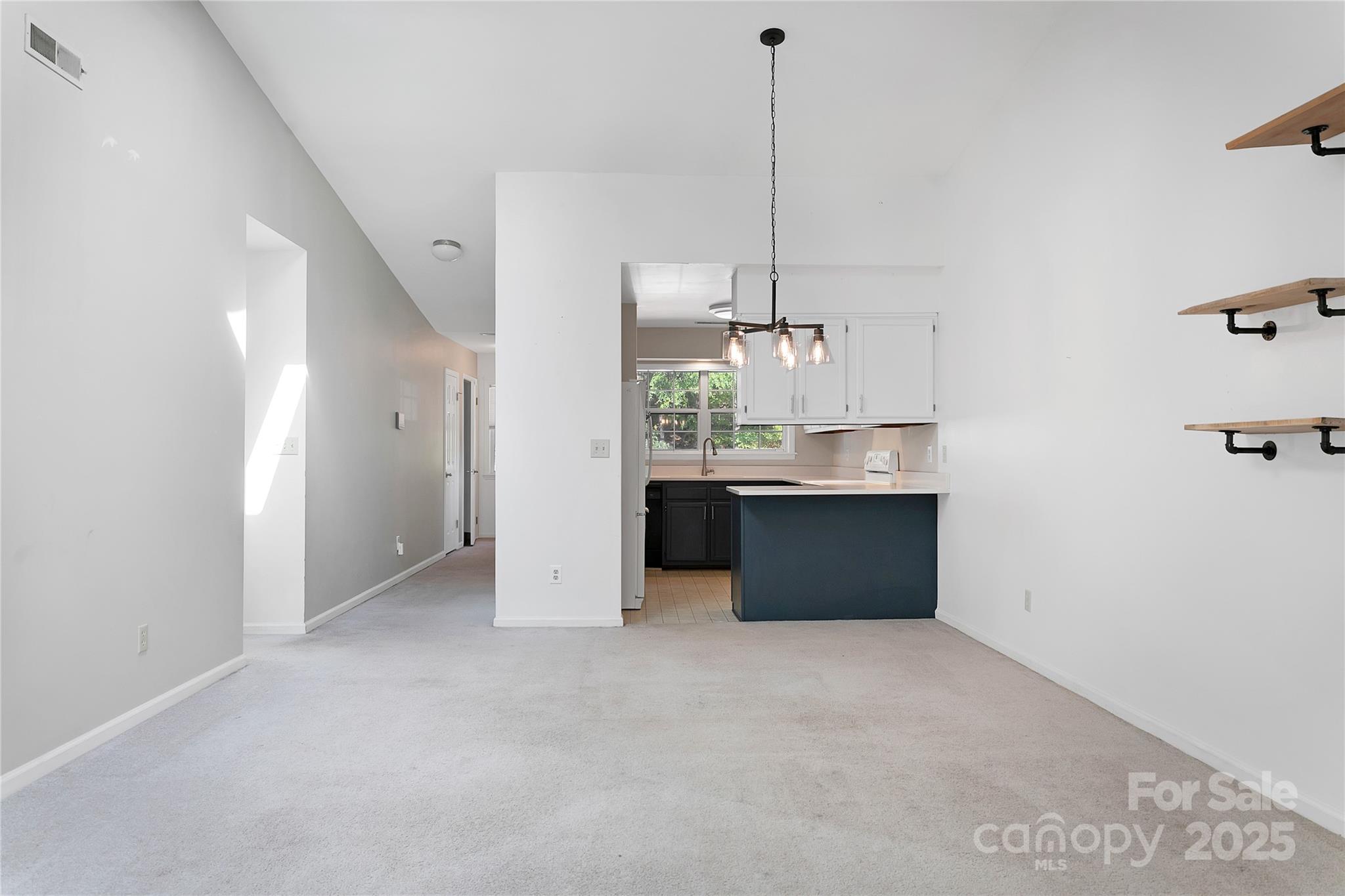 110 Lakeview Court Brevard, NC 28712 - Photo 7 of 30 a view of a kitchen with a sink and window